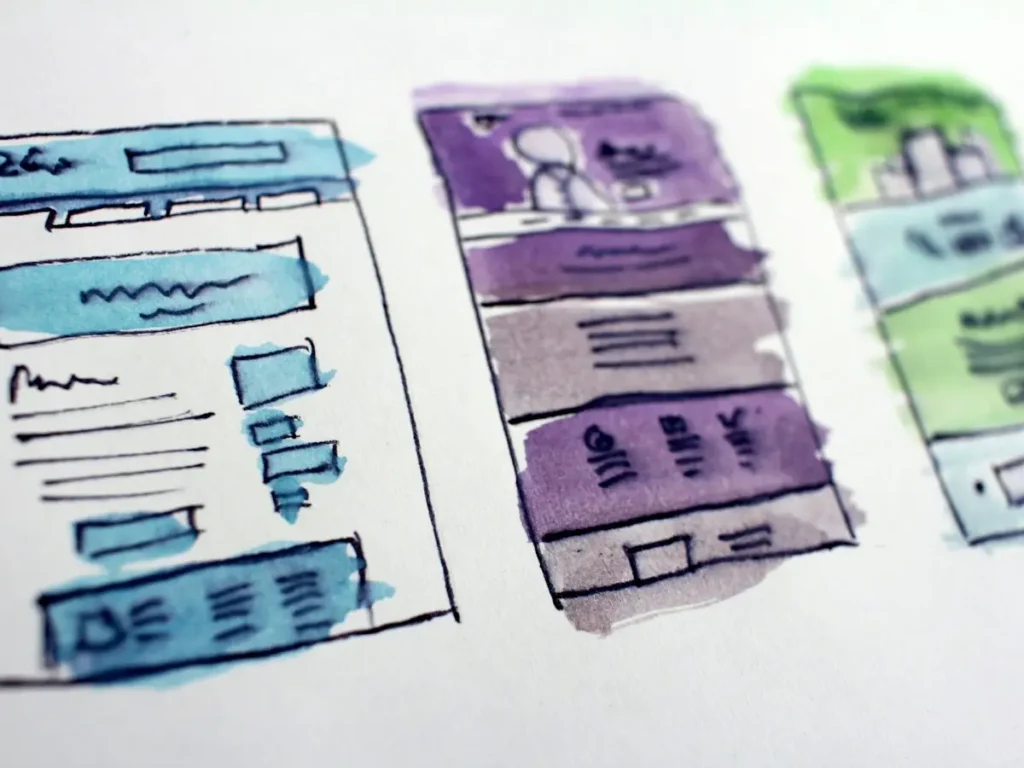 Wireframe sketches of website layouts for a UI/UX design project